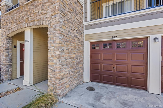 property entrance featuring a garage