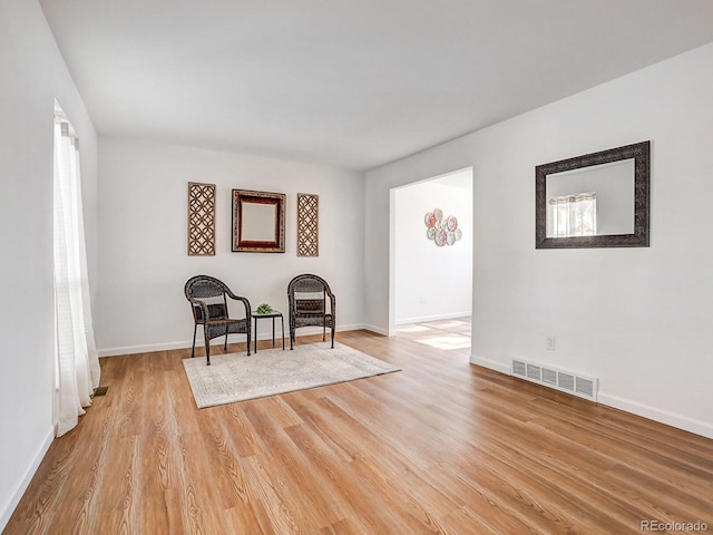 living area featuring light hardwood / wood-style floors