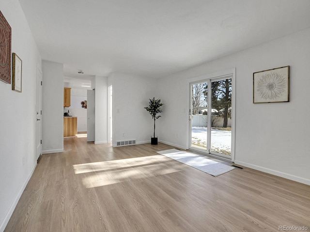 empty room featuring light wood-type flooring