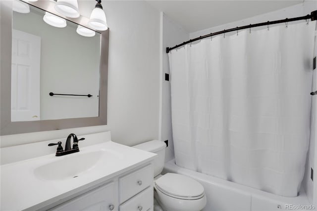 4802 E Kentucky Ave Unit E, Denver, CO 80246 - full bath featuring toilet, vanity, and shower / bath combo with shower curtain