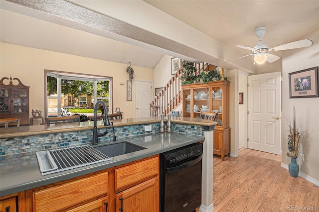 3300 W Florida Ave Unit 51, Denver, CO 80219 - kitchen featuring dishwasher, light wood-type flooring, a sink, ceiling fan, and dark countertops