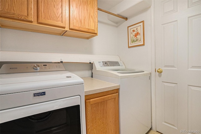 3300 W Florida Ave Unit 51, Denver, CO 80219 - laundry area with cabinet space and independent washer and dryer