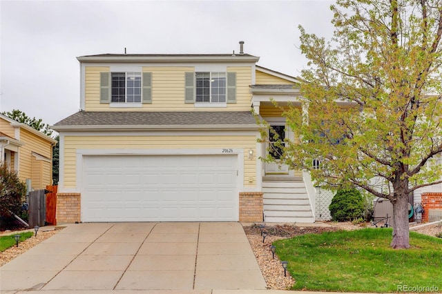 20626 Willowbend Ln, Parker, CO 80138 - view of front of house featuring concrete driveway, brick siding, and a garage