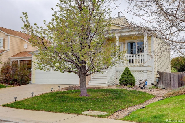 20626 Willowbend Ln, Parker, CO 80138 - view of front of house with stairs, concrete driveway, a porch, and a front lawn