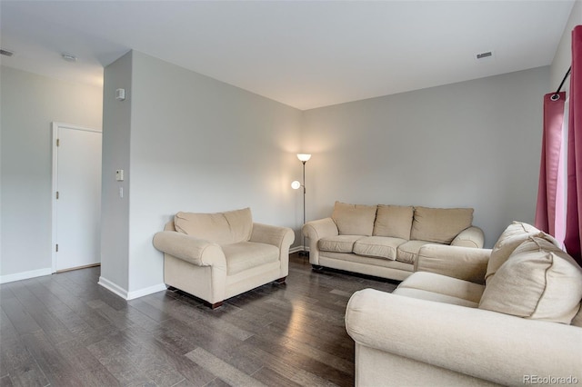 20626 Willowbend Ln, Parker, CO 80138 - living room featuring visible vents, dark wood finished floors, and baseboards