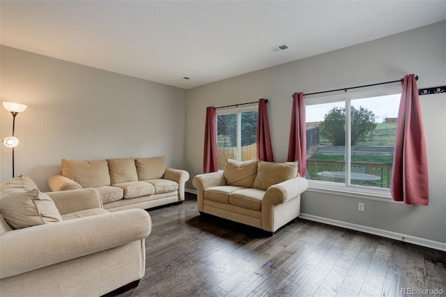 20626 Willowbend Ln, Parker, CO 80138 - living area with baseboards, dark wood finished floors, and visible vents