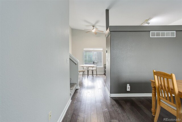 20626 Willowbend Ln, Parker, CO 80138 - hallway featuring baseboards, dark wood-style floors, stairs, and visible vents