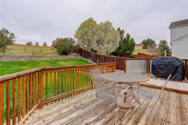 20626 Willowbend Ln, Parker, CO 80138 - wooden terrace with outdoor dining area, a fenced backyard, a lawn, and grilling area