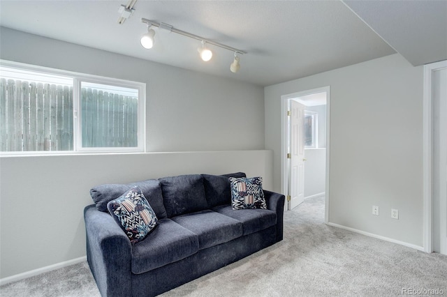 20626 Willowbend Ln, Parker, CO 80138 - carpeted living room featuring track lighting and baseboards