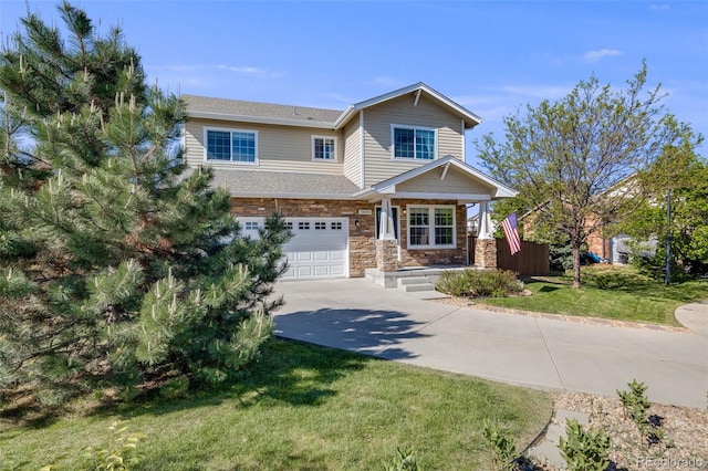 19294 E Warren Pl, Aurora, CO 80013 - view of front of home with driveway, an attached garage, a front yard, stone siding, and roof with shingles