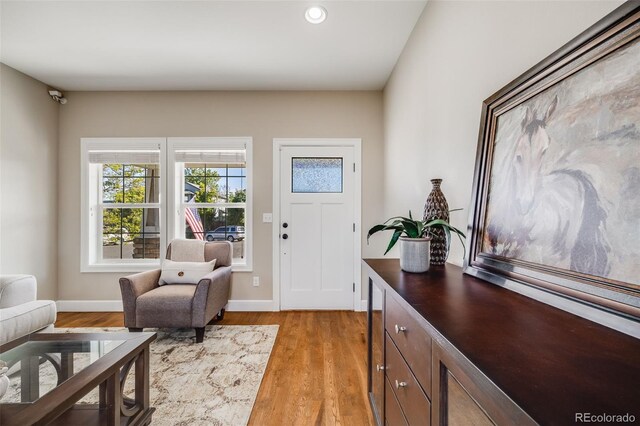 19294 E Warren Pl, Aurora, CO 80013 - entrance foyer with light wood finished floors, baseboards, and recessed lighting