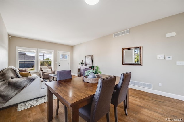 19294 E Warren Pl, Aurora, CO 80013 - dining room featuring wood finished floors and baseboards