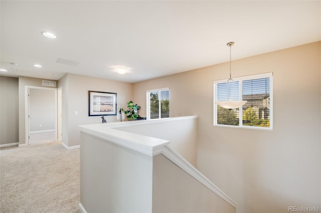 19294 E Warren Pl, Aurora, CO 80013 - hallway with an upstairs landing, baseboards, recessed lighting, and light colored carpet
