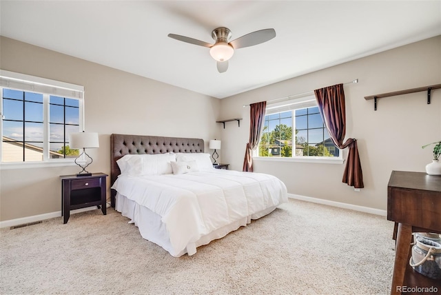 19294 E Warren Pl, Aurora, CO 80013 - carpeted bedroom with baseboards and a ceiling fan