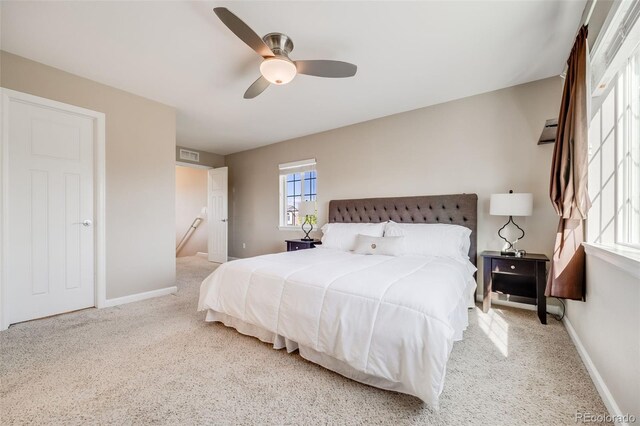 19294 E Warren Pl, Aurora, CO 80013 - carpeted bedroom with baseboards and ceiling fan