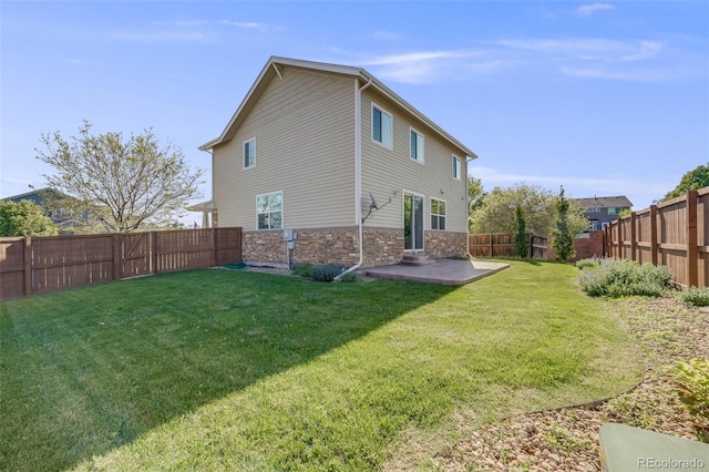 19294 E Warren Pl, Aurora, CO 80013 - rear view of property featuring a patio area and stone siding