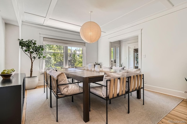 785 Fillmore St, Denver, CO 80206 - dining space with light wood-style flooring, baseboards, and beam ceiling