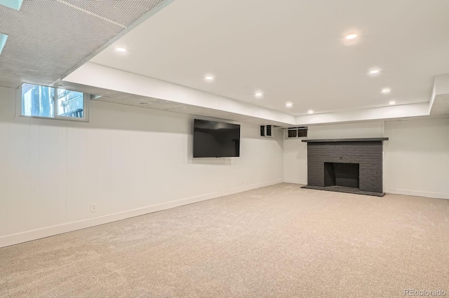 785 Fillmore St, Denver, CO 80206 - basement with light carpet, recessed lighting, baseboards, and a fireplace