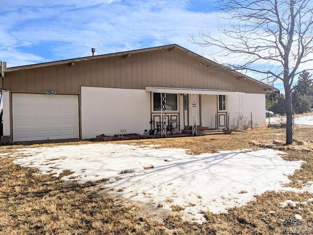 view of front of property featuring a garage