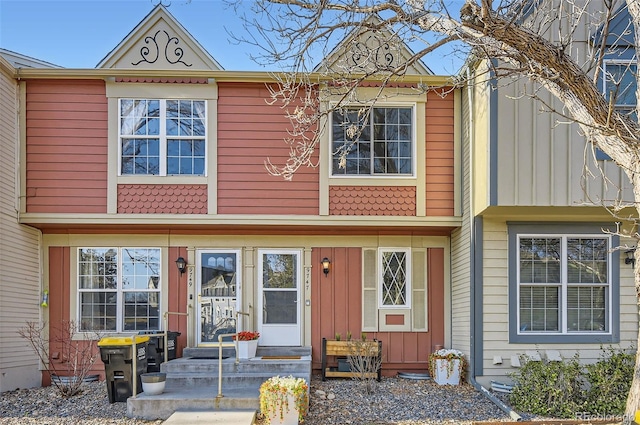 townhome / multi-family property featuring board and batten siding