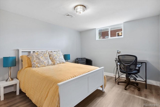5185 N Meade St, Denver, CO 80221 - bedroom with wood finished floors and baseboards