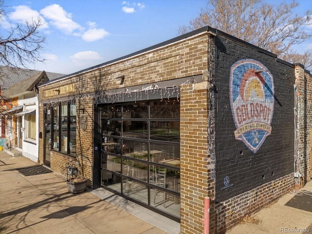 5185 N Meade St, Denver, CO 80221 - view of property exterior featuring brick siding