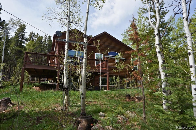116 Timber Rd, Black Hawk, CO 80422 - rear view of property with a wooden deck and stairs