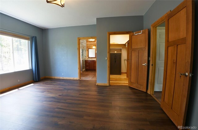 116 Timber Rd, Black Hawk, CO 80422 - unfurnished bedroom with dark wood-style flooring and ensuite bath