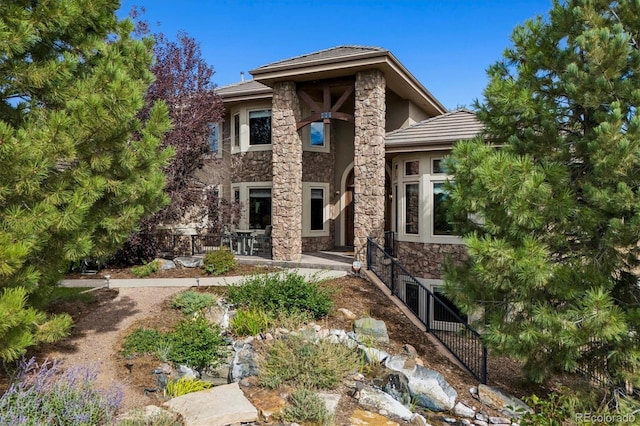 rear view of property with a patio area