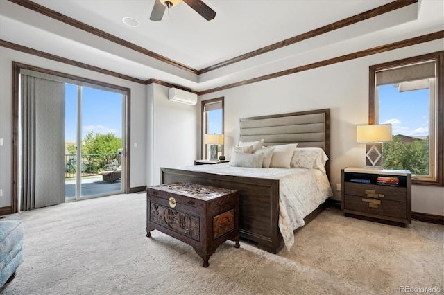 carpeted bedroom featuring crown molding, a tray ceiling, ceiling fan, access to outside, and a wall mounted air conditioner