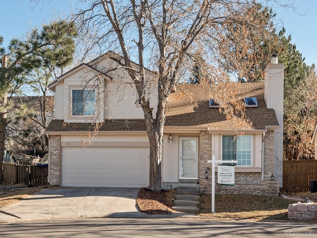 view of front of house with a garage