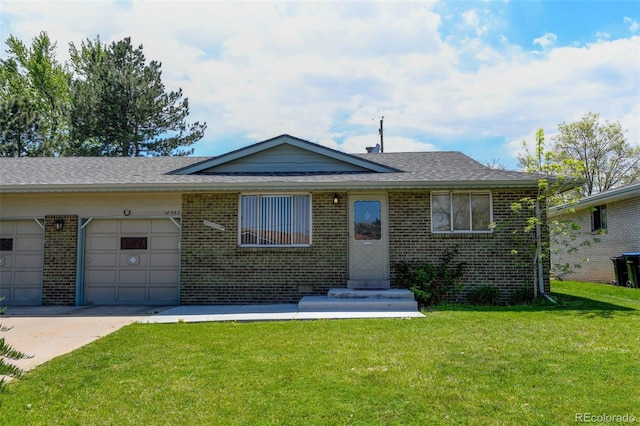 10560 W 63rd Ave, Arvada, CO 80004 - view of front of property with brick siding, a garage, a front yard, and concrete driveway