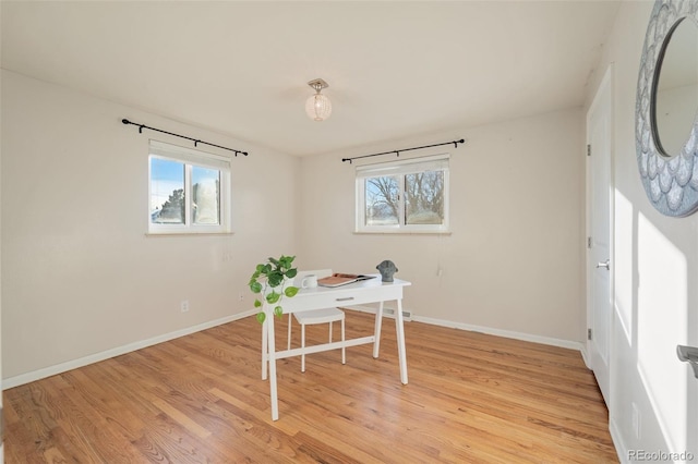 home office with light wood-type flooring