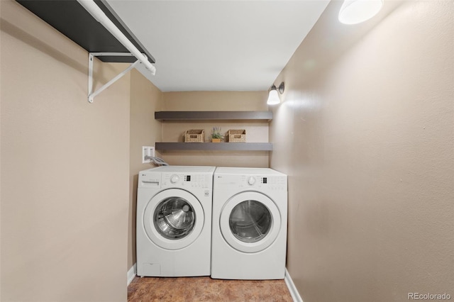 laundry room with separate washer and dryer