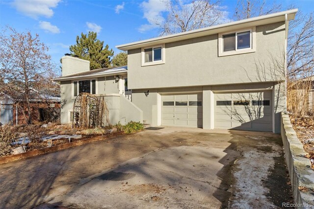 tri-level home featuring a garage