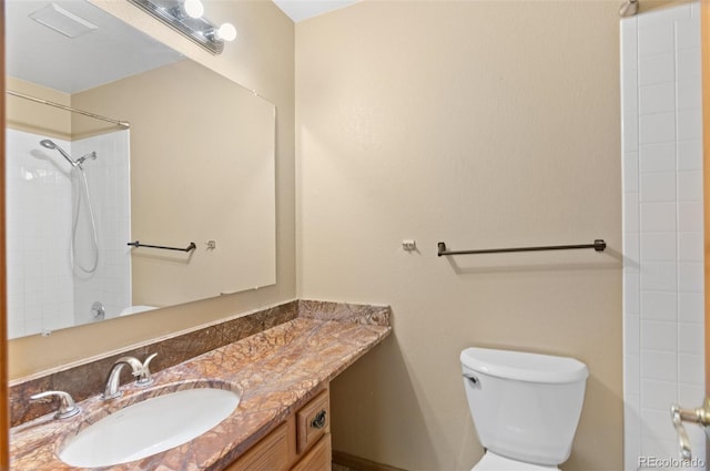 full bathroom featuring toilet and vanity