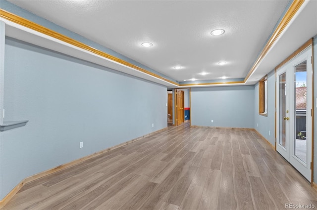 interior space with recessed lighting, baseboards, and wood finished floors