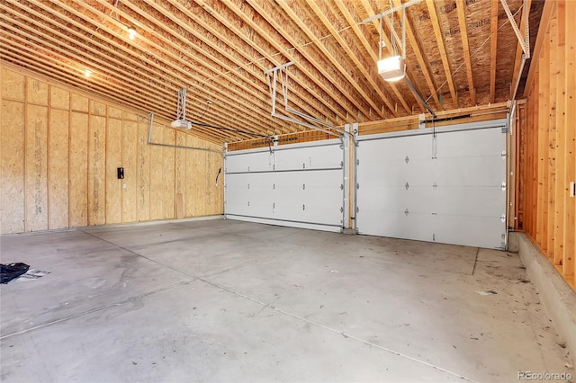 garage featuring a garage door opener