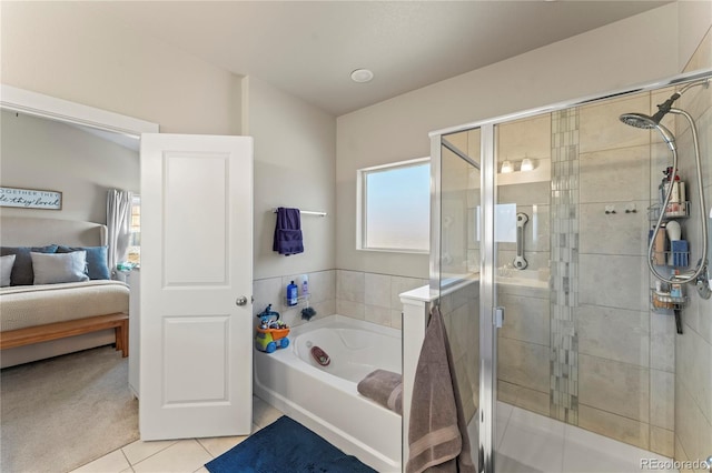 full bathroom with a stall shower, a garden tub, connected bathroom, and tile patterned floors