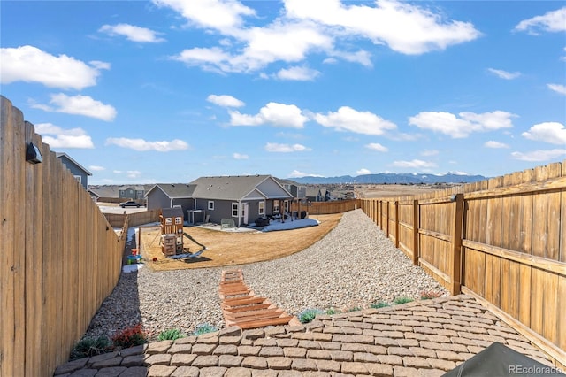 view of yard featuring a fenced backyard and a patio