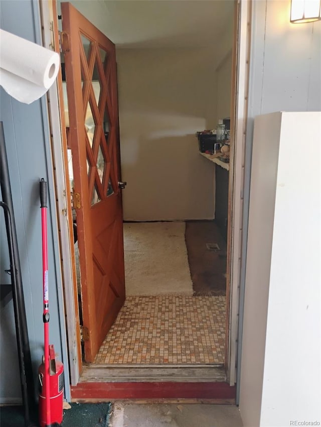 1011 Glen Creighton Dr, Dacono, CO 80514 - corridor featuring concrete flooring
