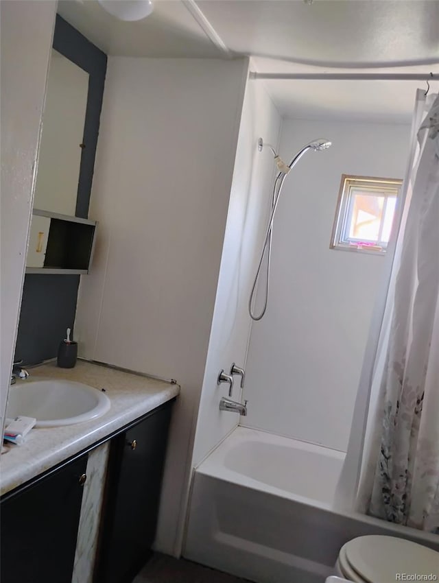1011 Glen Creighton Dr, Dacono, CO 80514 - bathroom with shower / tub combo with curtain, vanity, and toilet