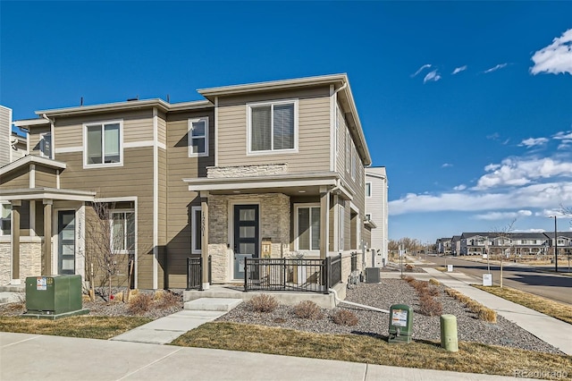 multi unit property featuring covered porch and central AC