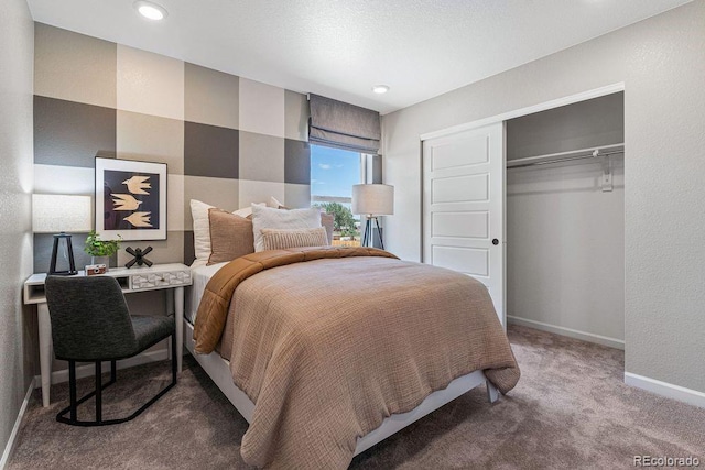 2118 Wagon Wheel Aly, Brighton, CO 80601 - bedroom with carpet flooring, a closet, and recessed lighting