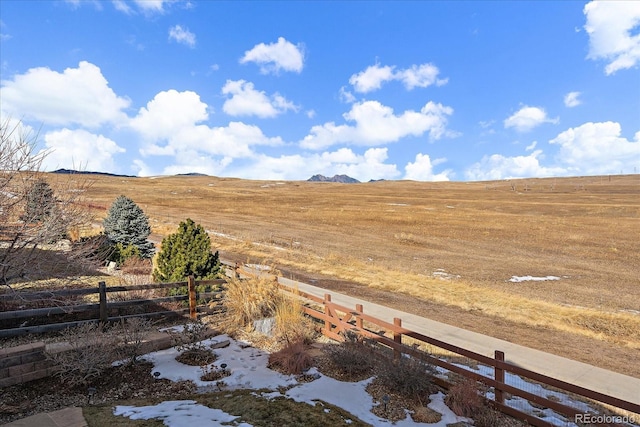 view of mountain feature with a rural view