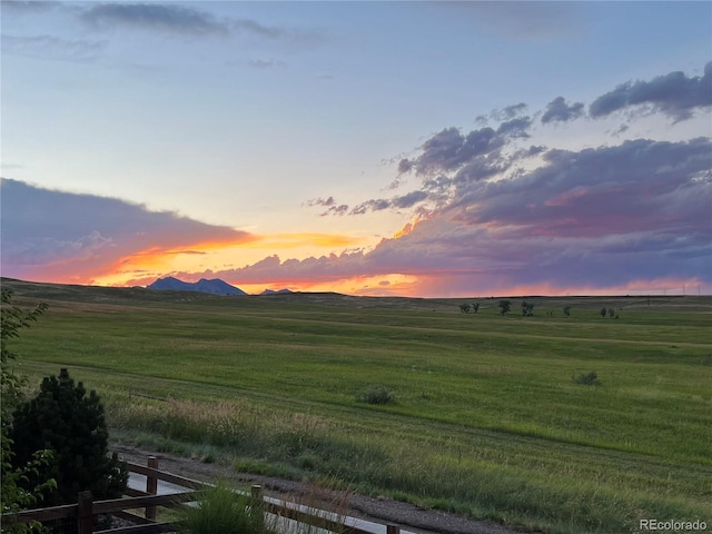 view of mountain feature with a rural view