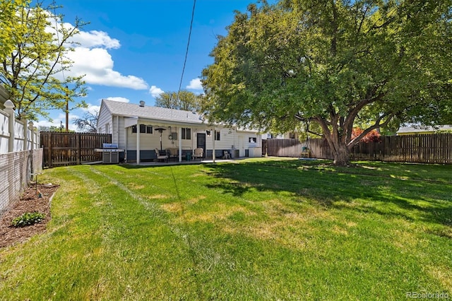 1211 S Zuni St, Denver, CO 80223 - rear view of house featuring a patio