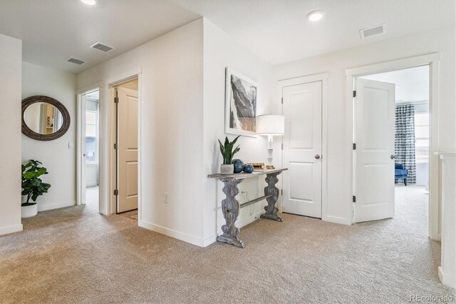 27756 E Byers Pl, Aurora, CO 80018 - hallway with carpet flooring, baseboards, and recessed lighting