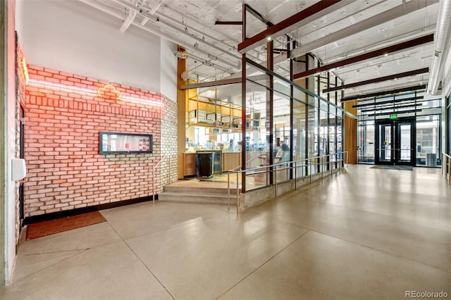 1750 Wewatta St Unit 605, Denver, CO 80202 - common area featuring brick wall