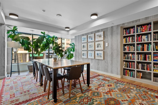 1750 Wewatta St Unit 605, Denver, CO 80202 - dining space with baseboards and wood finished floors